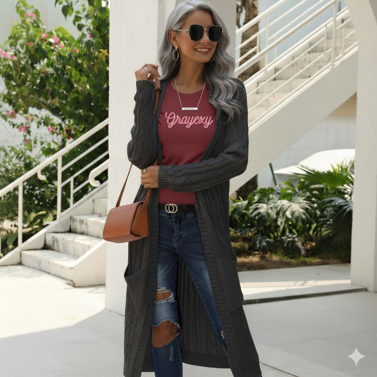 woman wearing long sweater outside casual attire