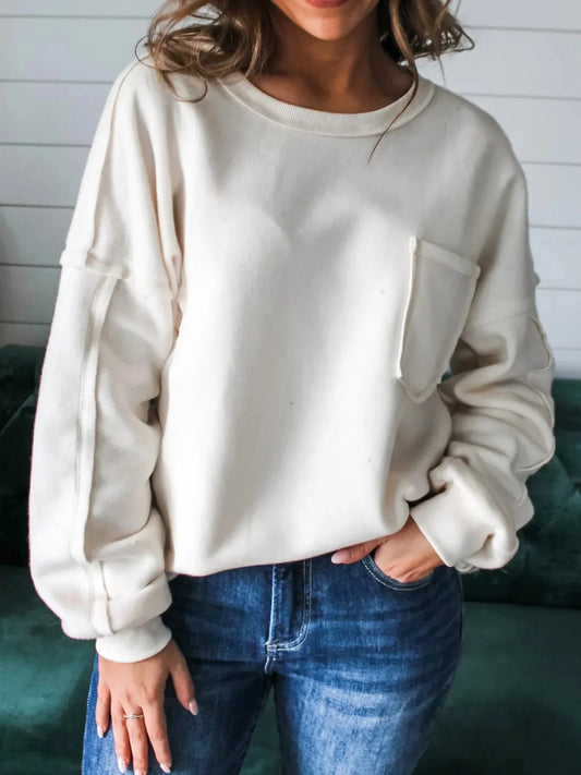 Cozy Cream Exposed Seam Knit Pocket Pullover Sweatshirt